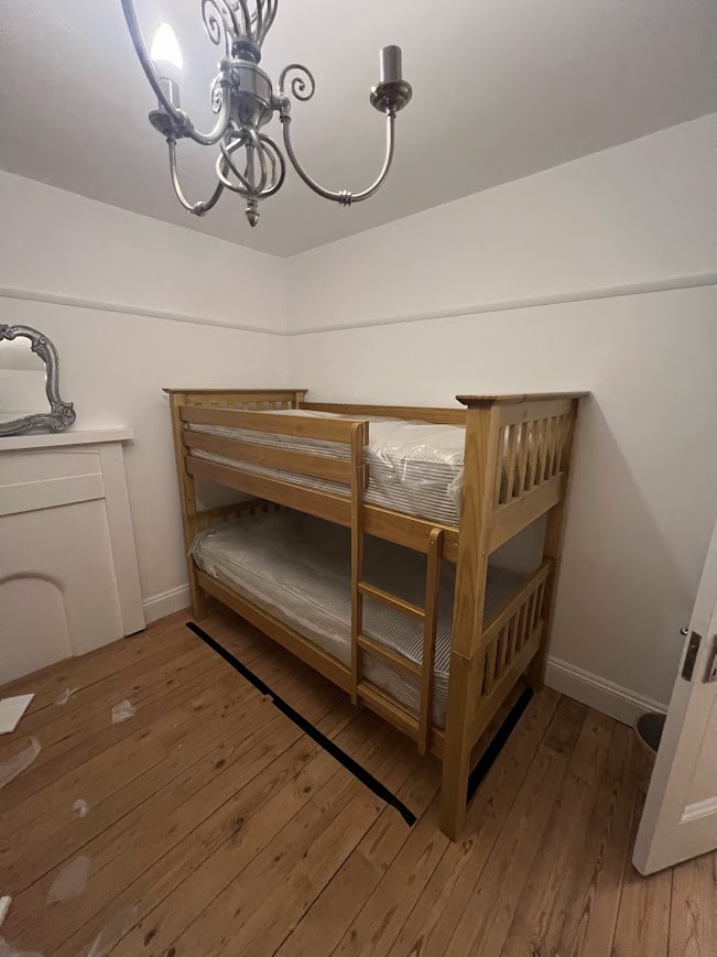 Pine bunk bed assembled in a bedroom